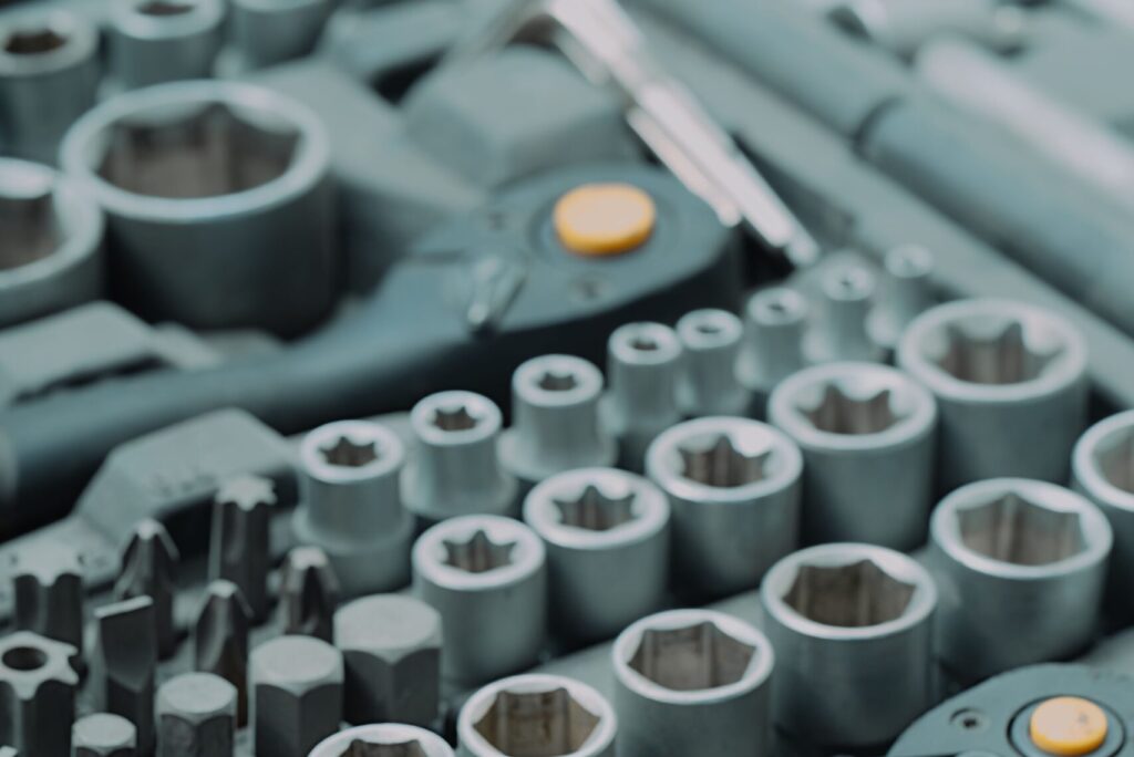 Detailed view of a ratchet and socket tool set, ideal for mechanics and DIY projects.